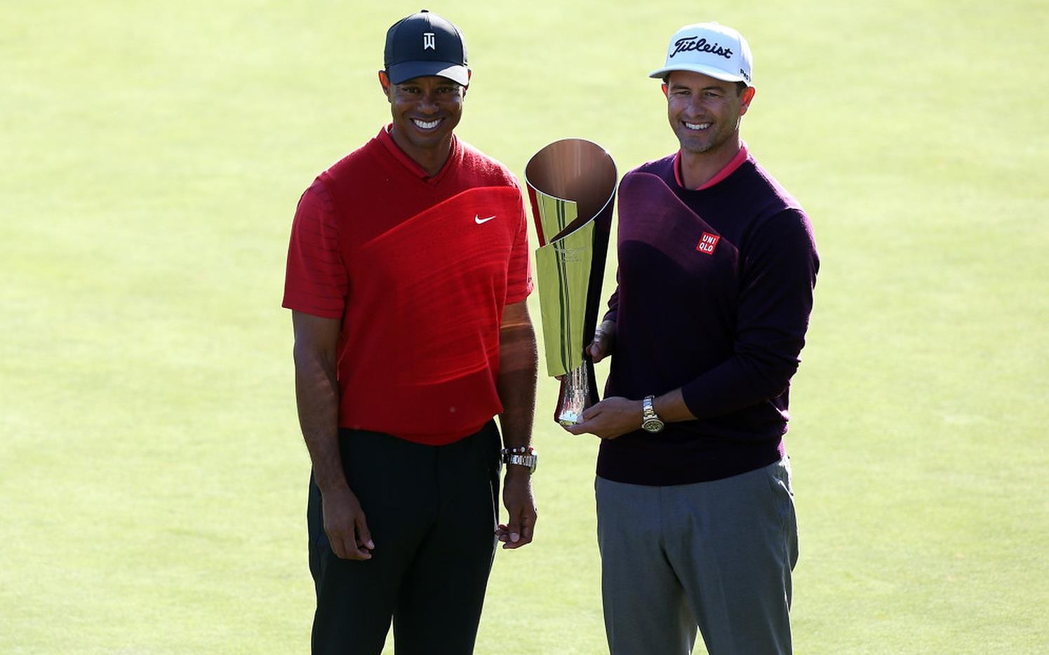 Adam Scott met gastheer Tiger Woods na zijn zege in de Genesis Invitational